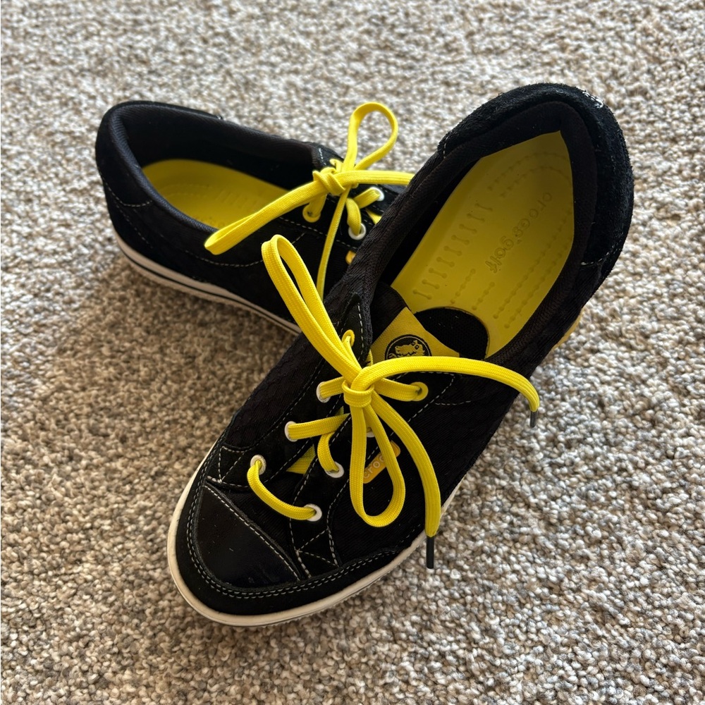 Crocs Golf women’s Black with Yellow Accents Shoes.